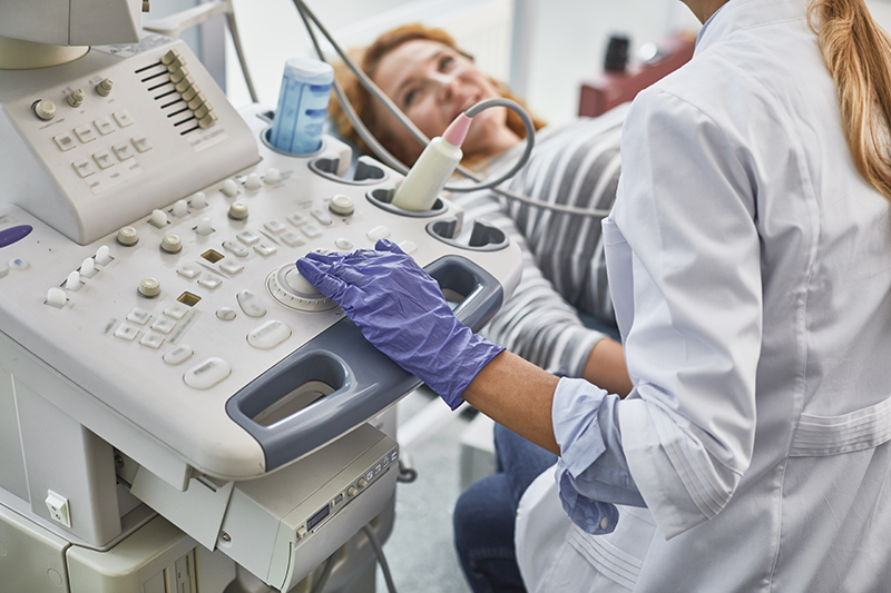 Pregnant woman getting ultrasound